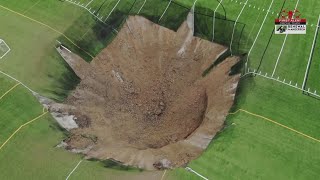 Video shows massive sinkhole open up in the middle of soccer field in Illinois [upl. by Weiser]