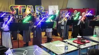 Childrens orchestra plays the music from star wars on the violin use lightsabers [upl. by Otilesoj140]