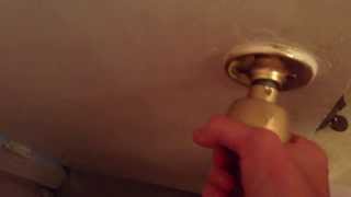 How to unlock a door with a twist knob lock [upl. by Ynhoj]