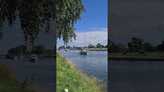 ⛵🌅 Boats at Canal between Middelburg and Vlissingen travelwithhugof zeeland netherlands boats [upl. by Enywad]