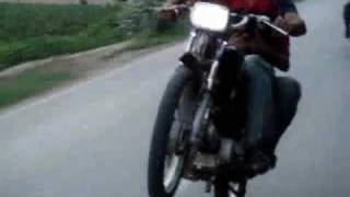 wheelie on 70cc bike Okara Pakistan [upl. by Lehsreh]