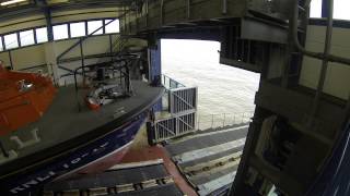 Cromer Lifeboat launching from Cromer Pier Boathouse [upl. by Hadwin]