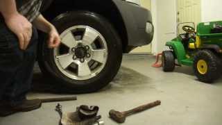 How to Extract or Remove broken or stubborn locking lug nuts on a car or SUV without a key [upl. by Ciapas]