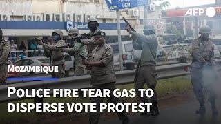 Police fire tear gas to disperse vote protest in Mozambique  AFP [upl. by Adgam500]