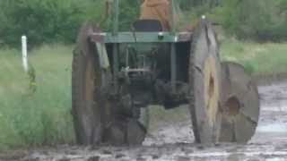 Tall Thin Metal Tractor Tires in the Crawfish Pond Mud  Steel Tractor Wheels  1080HD [upl. by Rexferd223]