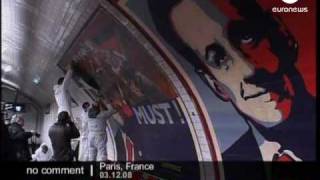 Greenpeace environmental activists plaster a metro station in Paris with posters [upl. by Eibber]