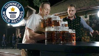 Most Beer Steins Carried Over 40m  Guinness World Records [upl. by Decker]