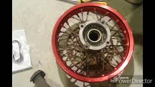 Installing new bearings on pit bike wheel [upl. by Selyn]