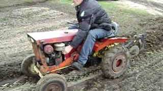 Allis Chalmers B10 Simplicity Landlord tractor plowing garden April 2011 [upl. by Nahamas]