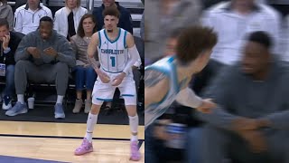 LaMelo Ball hits 3 and points at Thanasis for talking trash while courtside 😂 [upl. by Badr]