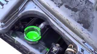 Car Coolant  AntiFreeze Replacement DIY Maintenance on Mazda Familia [upl. by Mena81]