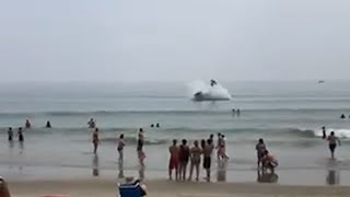 Plane crash lands into ocean off Hampton Beach in NH [upl. by Nosnarb]