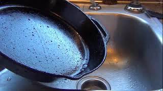 Seasoning cast iron pan with flax oil last step polish and egg test [upl. by Anirtac]