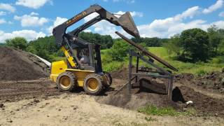 New Holland LS170 Screening and Piling Topsoil [upl. by Ruttger]