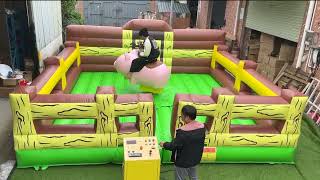 Lovely mechanical rodeo pig inflatable bull riding machine with control panel for carnival bull ride [upl. by Leiram]