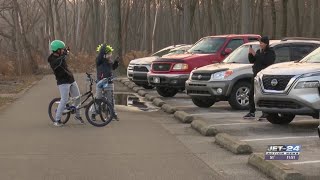 Erie residents celebrate unseasonably warm Christmas at Presque Isle [upl. by Maril]