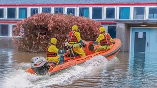 Heroic Rescue of Trapped Dog from Flooded School [upl. by Aiken]