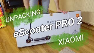 Xiaomi Mi Electric Scooter Pro 2  Unpacking quick review assembly  invitation to my future vlog [upl. by Airdnalahs806]