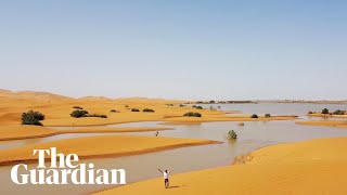 Drone footage shows rare flooding in the Sahara desert [upl. by Jephthah607]