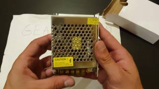 100  240 to AC  DC 12V 5A 60W Converter unboxing GEARBESTCOM [upl. by Kucik721]