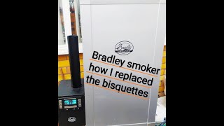 Bradley smoker how to replace bisquettes [upl. by Dukie368]