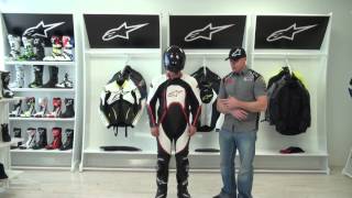 Alpinestars Orbiter One Piece Leather Race Suit Review from SportbikeTrackGearcom [upl. by Anoirtac662]