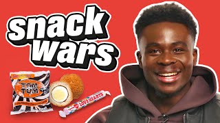 Arsenal Star Bukayo Saka Rates British And Nigerian Food  Snack Wars [upl. by Niamrahc747]