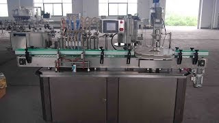 aerosol cans spray bottles linear filling machine rotary capping automatic line for liquid spraying [upl. by Anaahs]