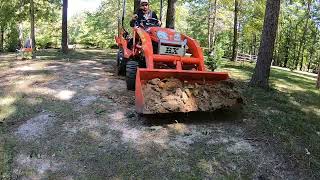 leveling  grading with the kubota bx25 [upl. by Atnima]