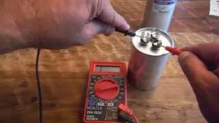 How to test a Dual Run Capacitor from Air Conditioner with a Multimeter [upl. by Acisset786]