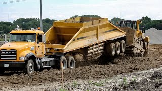 Cat D8T Bulldozer Lifts Trailer of Belly Dump  D8T Dozer Pushing Fill [upl. by Aneetsirk]