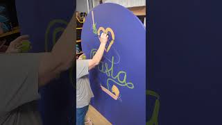 Painting a backdrop for the Purple Basil Food truck [upl. by Nimajnab]