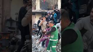 Civil defense crews and medical services pullout a little girl from under the rubble of a hamefree [upl. by Uhthna198]