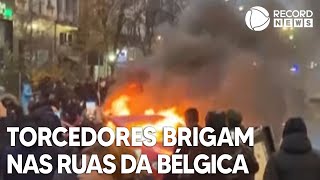 Torcedores causam confusão nas ruas da Bélgica [upl. by Ardnuhsor]