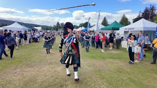 A mace flourish from Drum Major leading Towie Pipe Band march off at 2024 Aboyne Highland Games [upl. by Jasik]