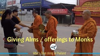 Giving Alms  offerings to Monks on the street in Thailand [upl. by Gregrory998]