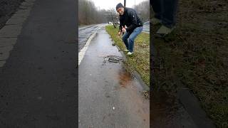 S017 Unclogging a storm drain from a road in Germany shorts [upl. by Cantlon]