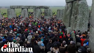 Record crowd celebrates winter solstice at Stonehenge [upl. by Hgielar]