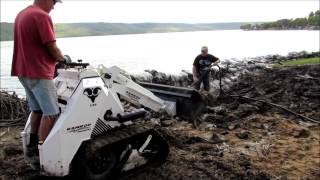 RAMROD Mini Skid Loader 1150  Rebuilds shoreline [upl. by Stern]