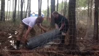 Rolling Out Woven Wire Fence [upl. by Nnylear]