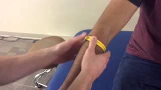 Counterforce bracing technique tennis elbow [upl. by Wilmott612]