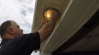 How to replace an outdoor light fixture  How to install light fixture above garage door [upl. by Trude]