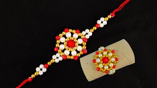 Easy Rakhi making with wool  Rakhi making using Pearls [upl. by Maurizia]