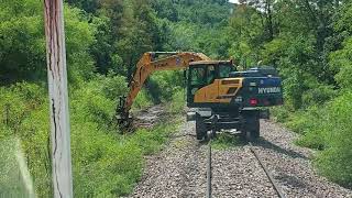 Hi Rail Excavator Ditching along the Tracks [upl. by Ayotak]