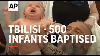 500 infants baptised in mass Orthodox ceremony [upl. by Thaddus]