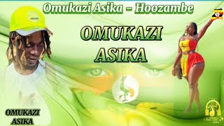 Omukazi asika by hoozambe dstar official lyrics video asika by hoozambe introvertlyrics shifra [upl. by Yadsendew]