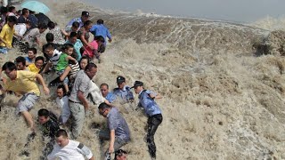 China wave shows its power Worlds largest tidal bore in Qiantang river 2023 [upl. by Erdreid]