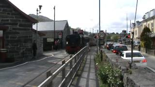 Welsh Highland Railway crossing Porthmadog [upl. by Alahcim]