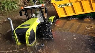 BRUDER SPIELWAREN TRACTORs CLAAS XERION 5000 Joskin tipping trailer [upl. by Iclehc]