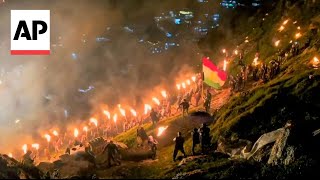 Iraqi Kurds celebrate Newroz by carrying torches and fireworks [upl. by Hazel]